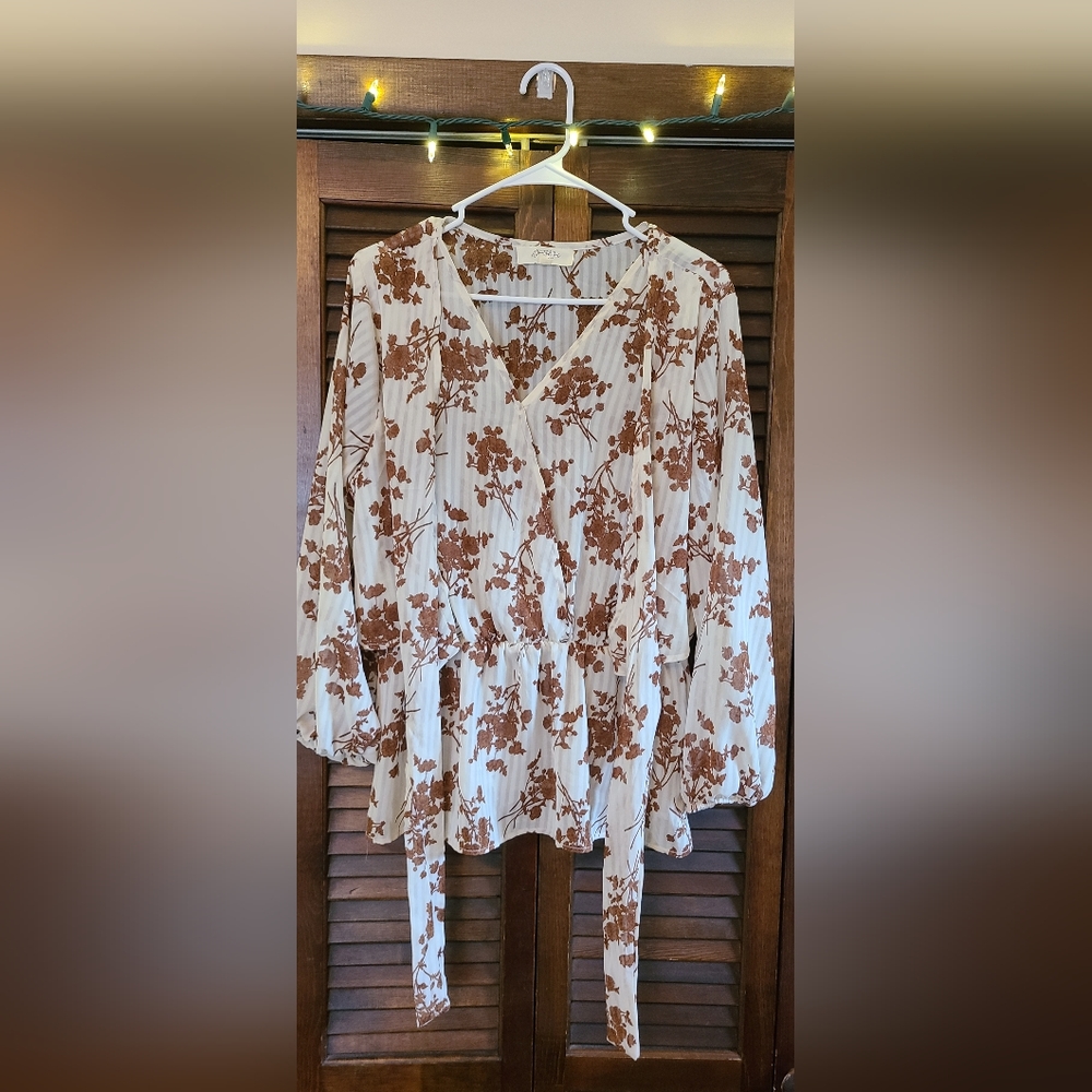 White with brown floral shirt
